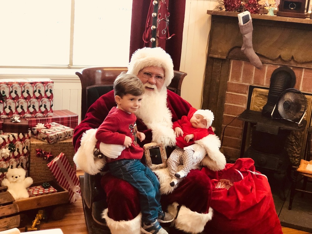 Santas Workshop, kid with Santa