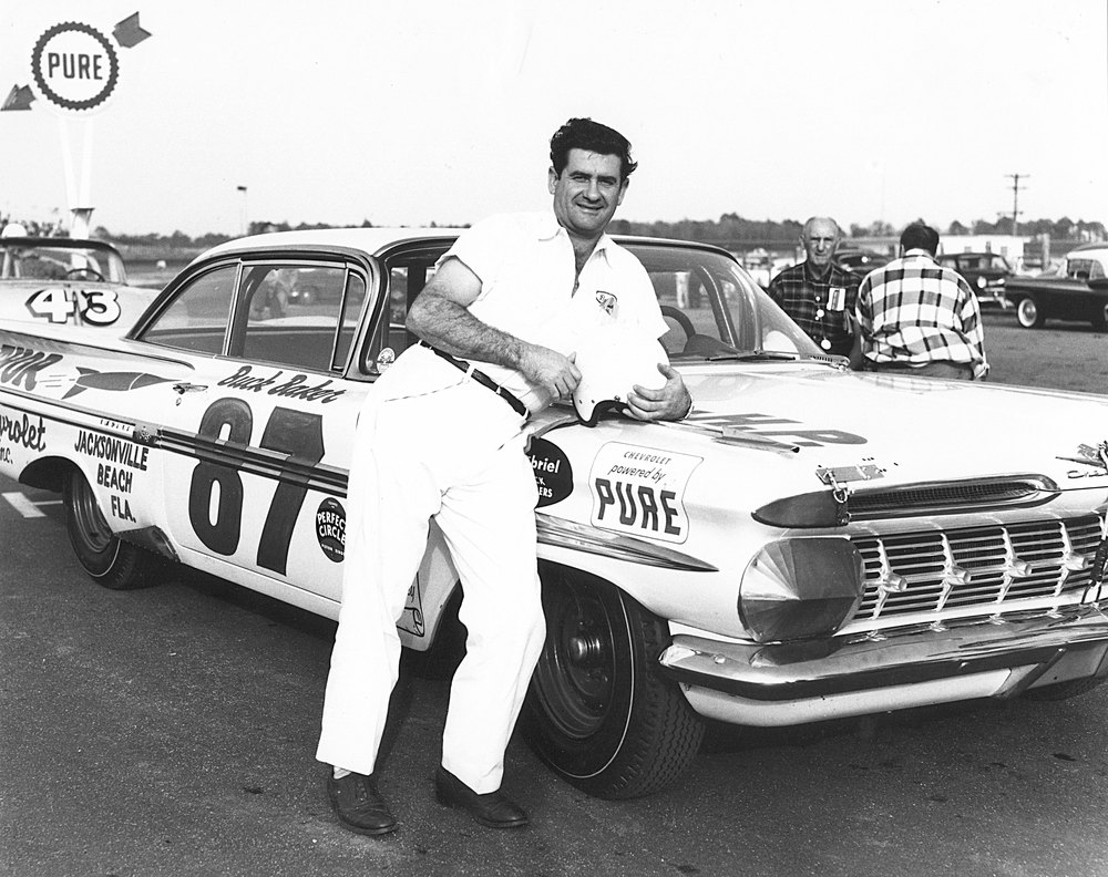 Buck Baker at the inaugural 1959 Daytona 500 at Daytona International Speedway is attached to this email for media use. Credit: NASCAR Images and Archives/Getty Images.